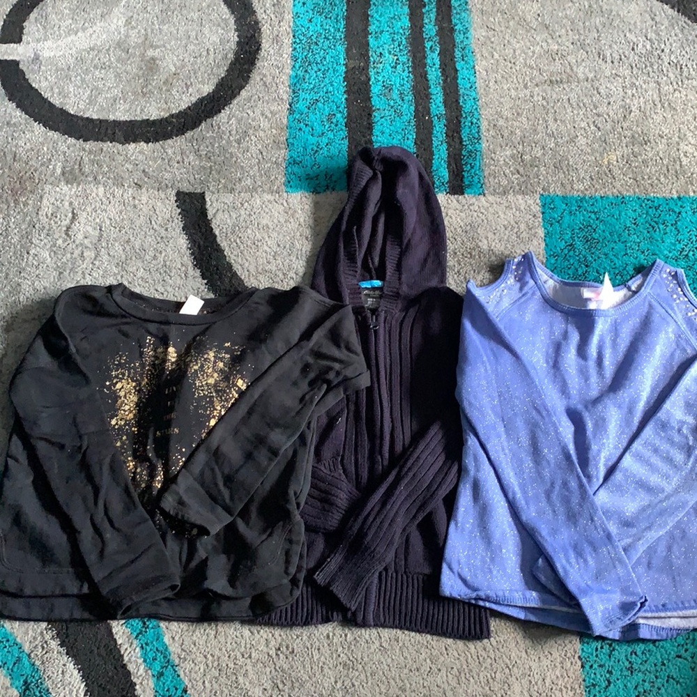Three girl sweaters